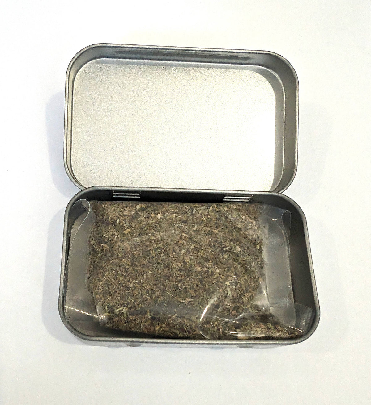 Catnip Tin with 1/3rd oz of freshly sealed catnip.