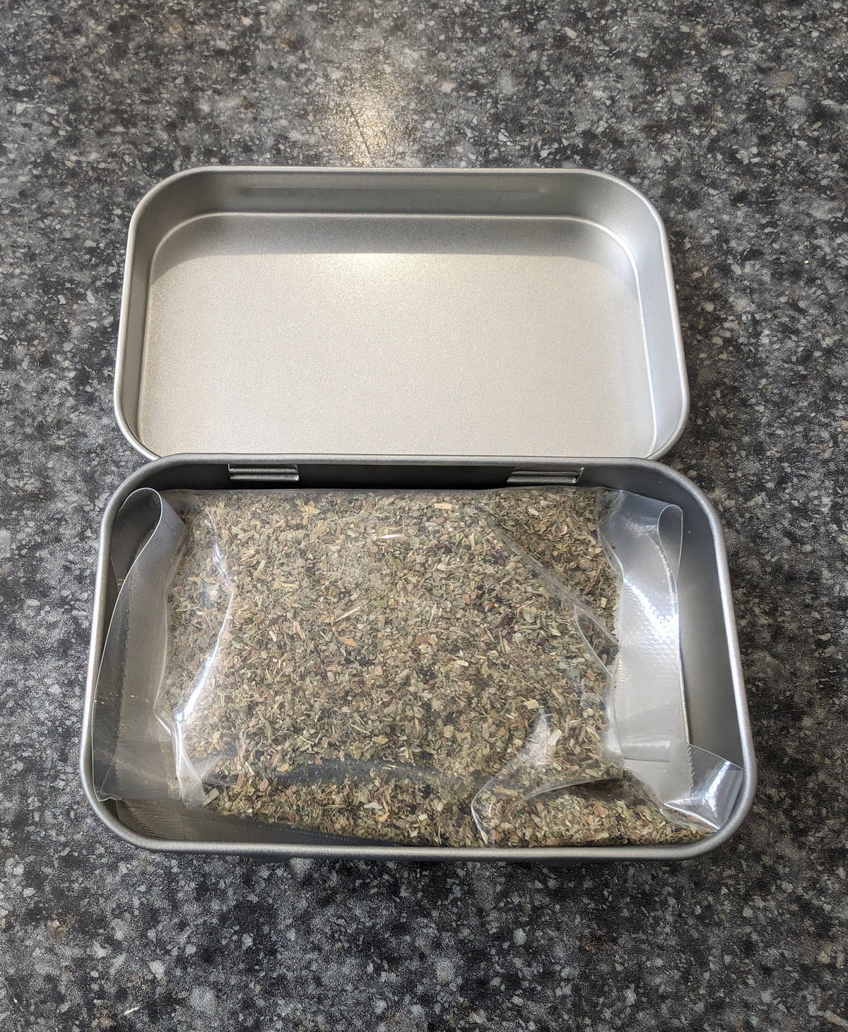 Catnip Tin with 1/3rd oz of freshly sealed catnip.