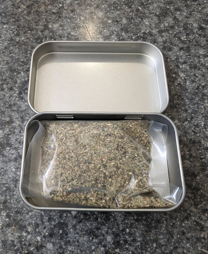Catnip Tin with 1/3rd oz of freshly sealed catnip.